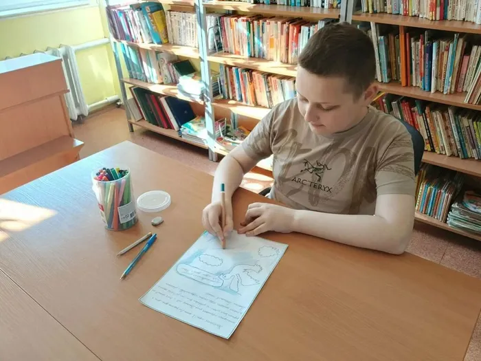За работой Максим