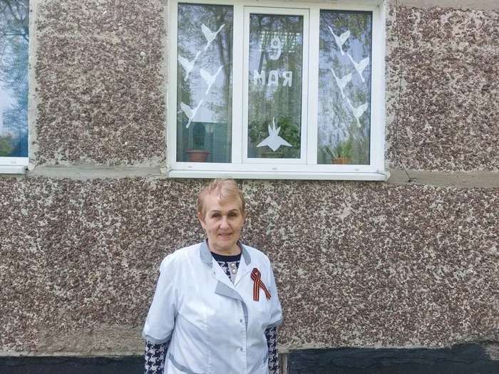 На фотографии участник патриотической акции Георгиевскаяя ленточка (4)